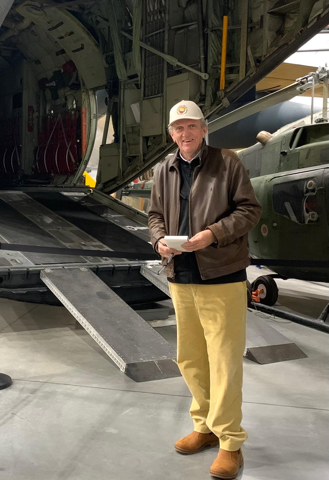 Ian Dash, founder of RoPAC, standing at the open rear cargo bay of a transport aircraft